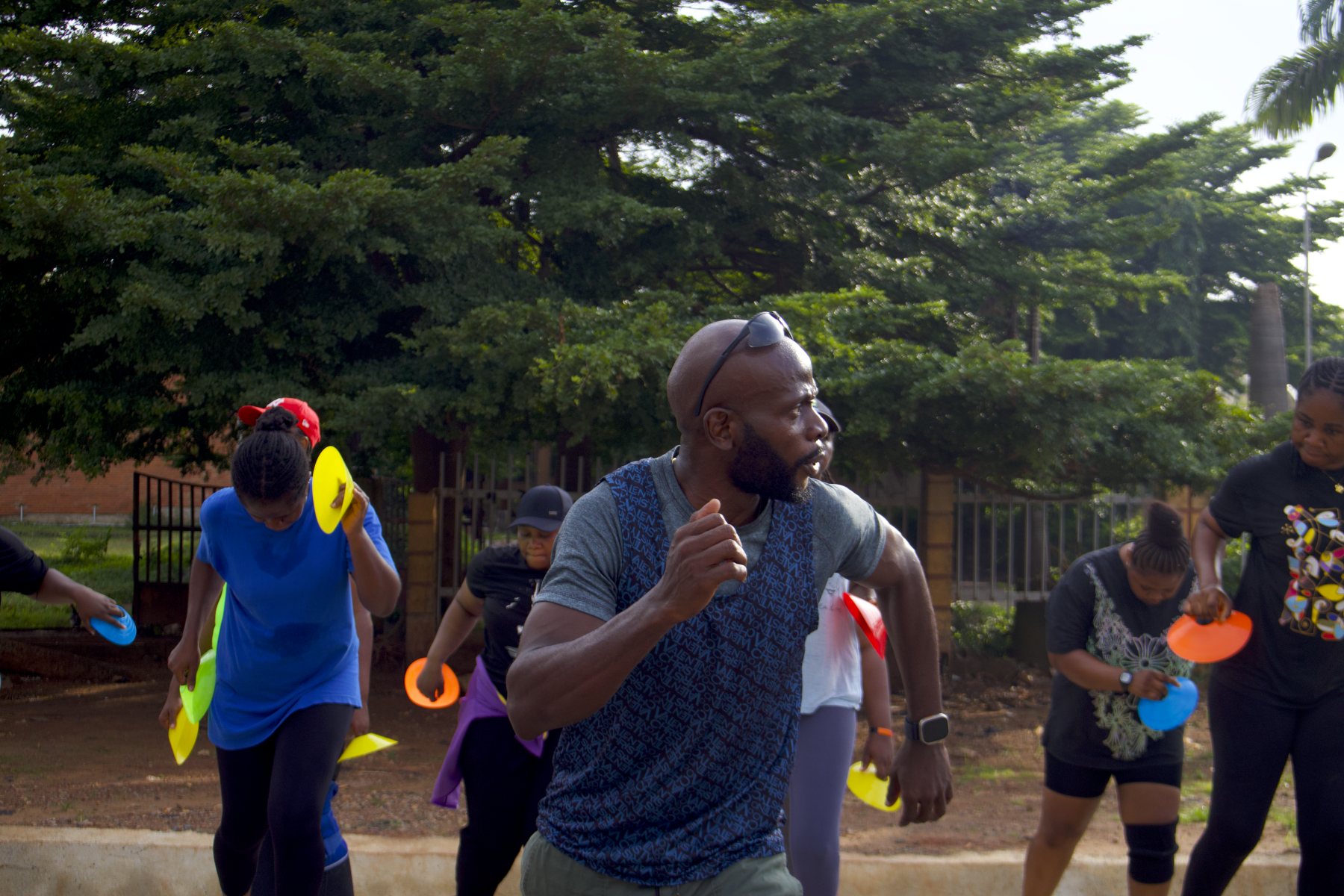 A trainer leading a cone workout